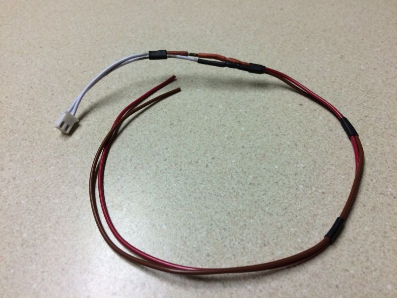 Wiring harness with white connector and brown wires