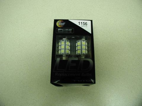 2002 Pontiac Grand Prix - A black box package displays two white LED replacement bulbs for automotive use. The packaging shows branding for "LED 360°", "PURE", and "…