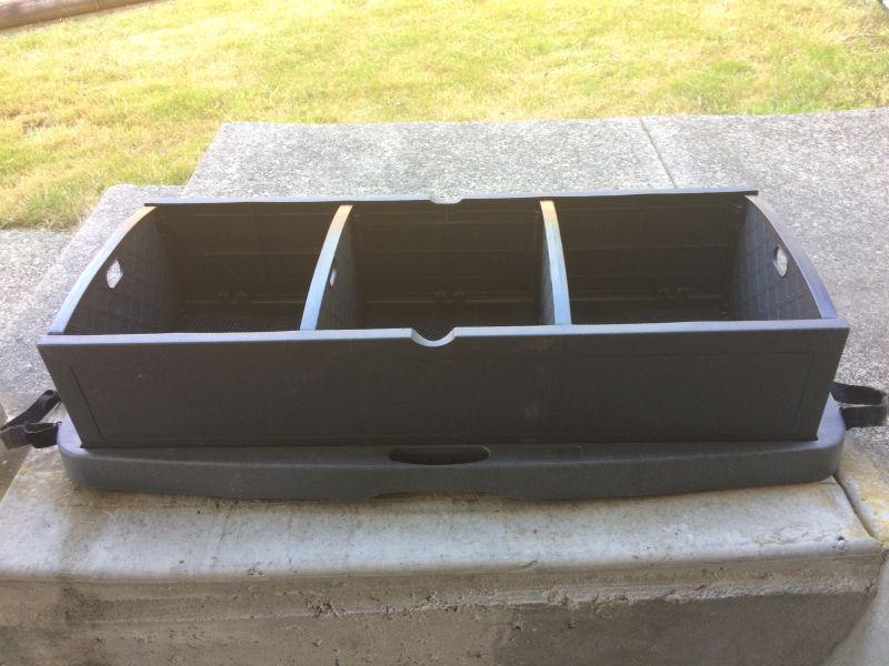 Black plastic car trunk organizer with three compartments