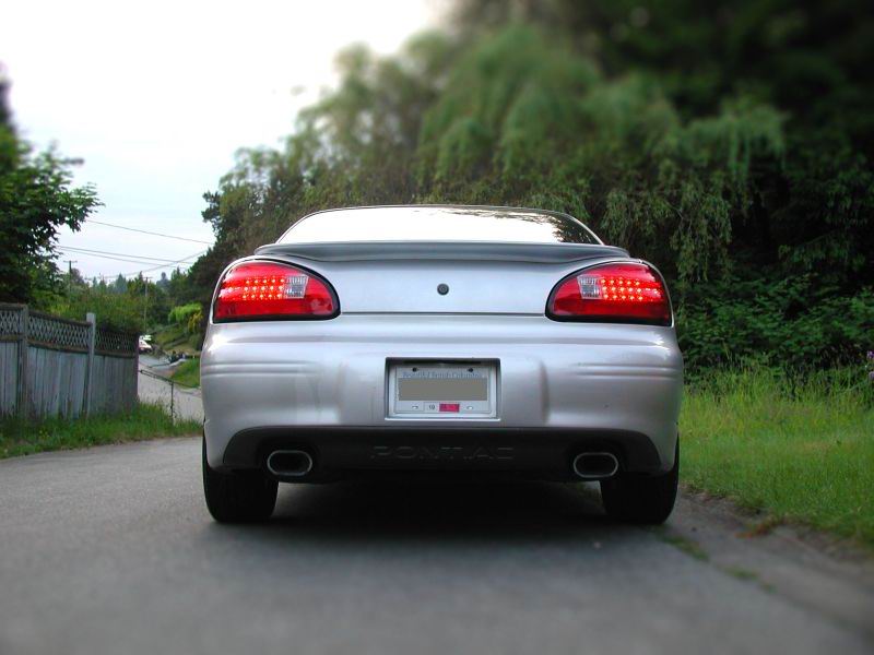 Silver 2002 Pontiac Grand Prix rear view