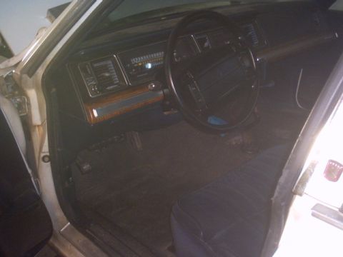 1991 Ford LTD Crown Victoria - Interior view of a 1991 Ford Crown Victoria, highlighting the dashboard and driver's area.