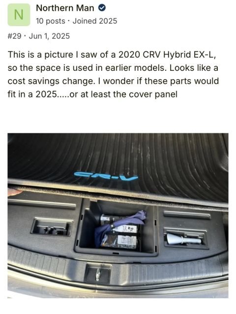 2026 Honda CR-V - The interior trunk space of a Honda CR-V shows a removable storage compartment with a folded umbrella and other items inside. A rubber mat…