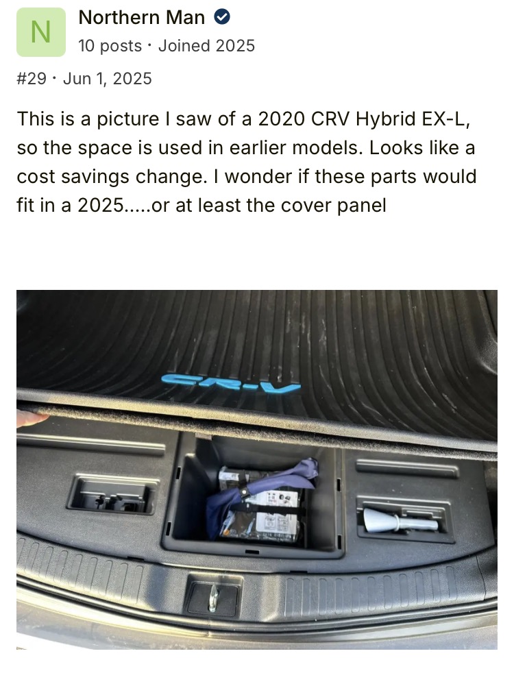 Honda CR-V trunk interior with storage compartment and blue CR-V logo mat.