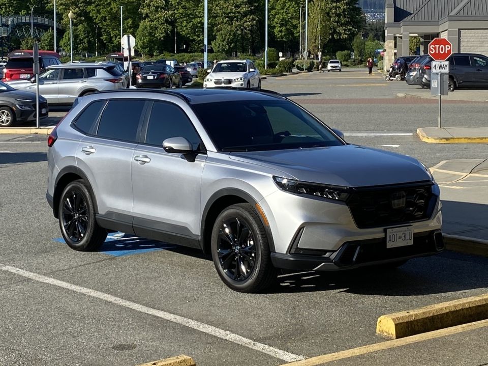 Silver 2026 Honda CR-V parked in a handicapped spot.