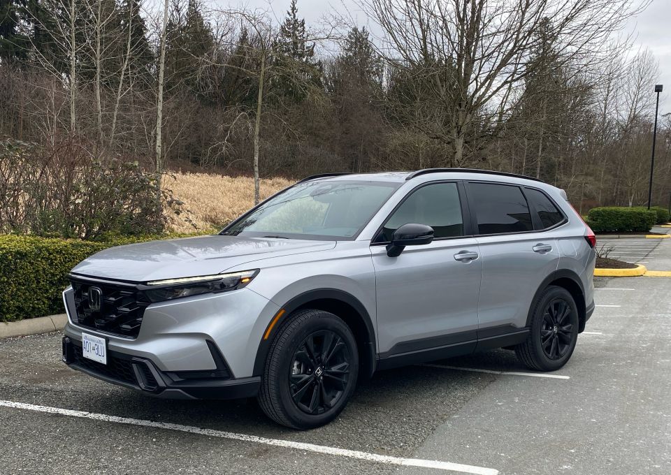 Silver 2026 Honda CR-V with black accents parked outdoors.
