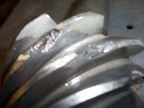 2000 Ford F-450 - This close-up shows the damaged teeth of a gear, indicating significant wear and potential failure.