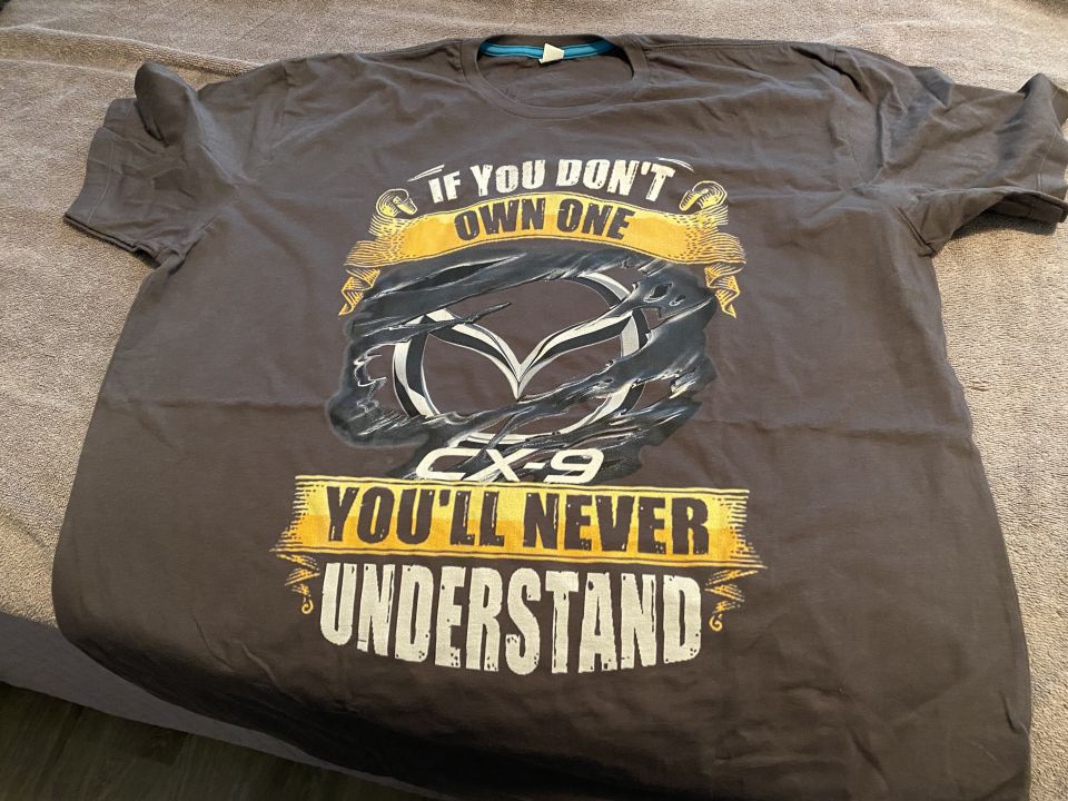 Gray t-shirt with Mazda CX-9 graphic and text.