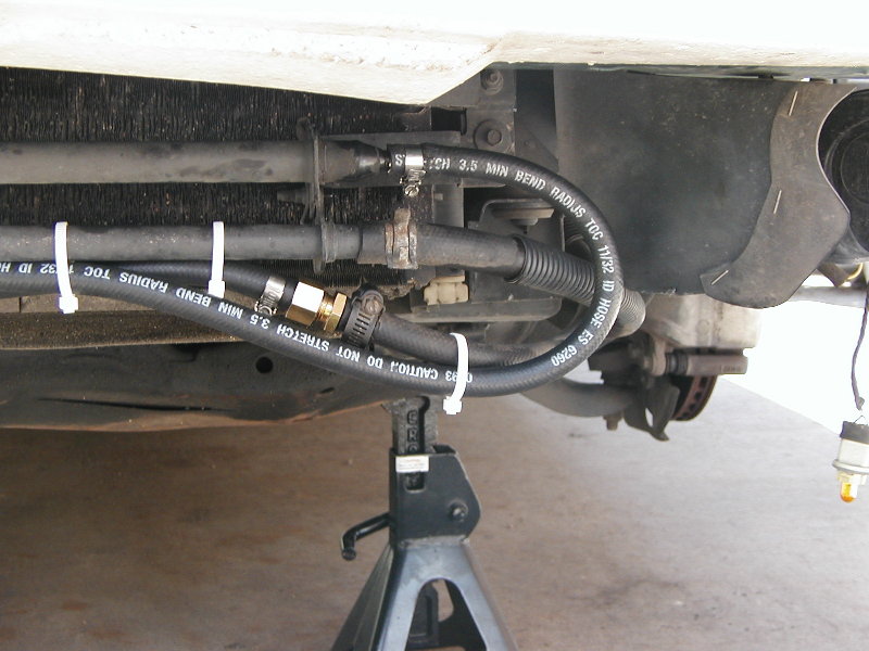 Close-up of where the new transaxle cooler lines splice into the OEM cooler.