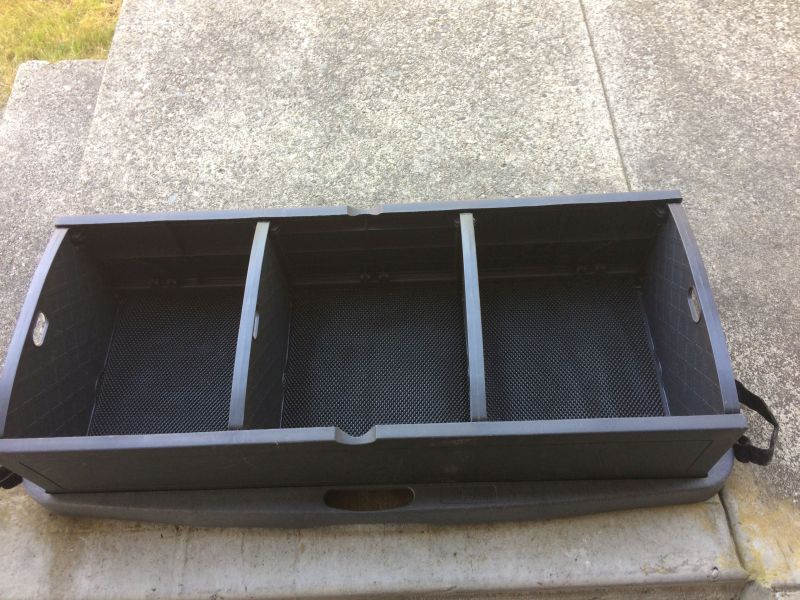 Used this cargo/trunk organizer that I had in the Grand Prix. GM # 12498559.