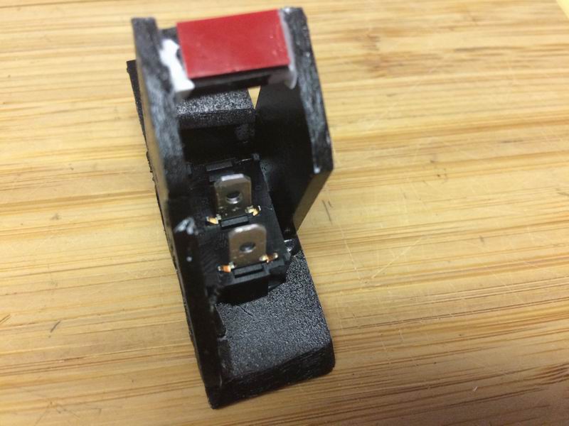 I made this plastic switch holder for the cubby, but the adhesive wouldn't hold and it ended up falling to pieces as I installed it.....