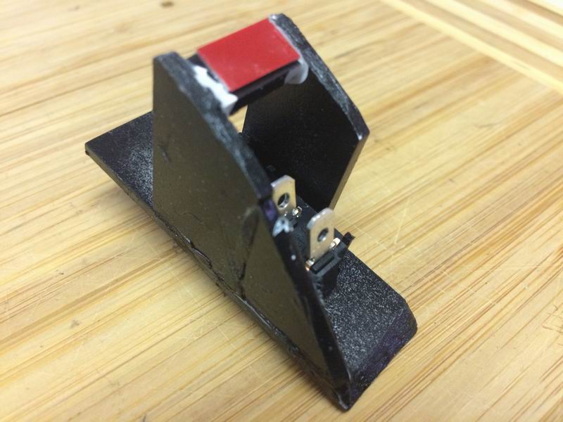I made this plastic switch holder for the cubby, but the adhesive wouldn't hold and it ended up falling to pieces as I installed it.....