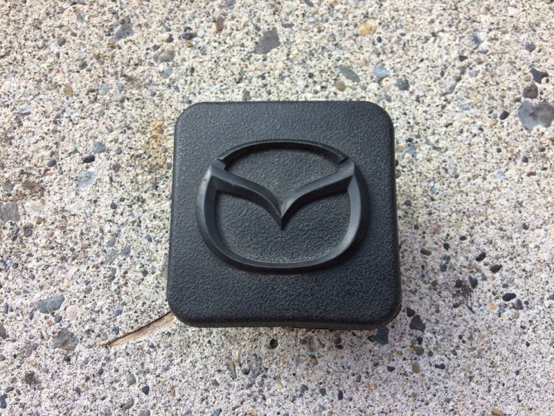 Factory hitch cover.