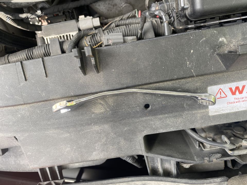 13mm wrench "modified to access the upper ball mount nut.