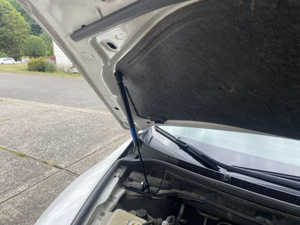 Re-install the liner and install the struts.