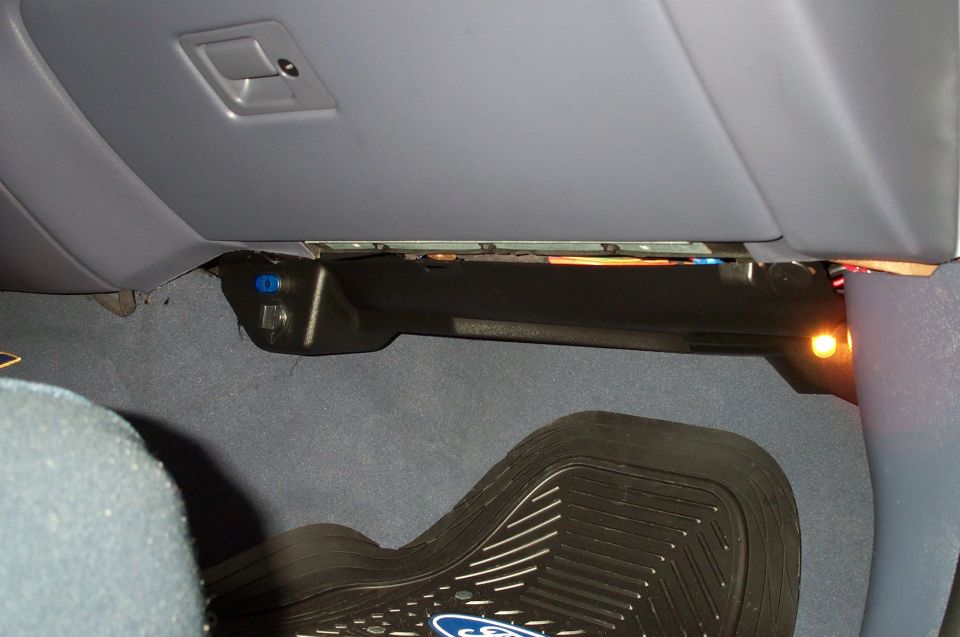 A close up of the passenger side panel with the auxillary outlet. I installed the toggle switch.