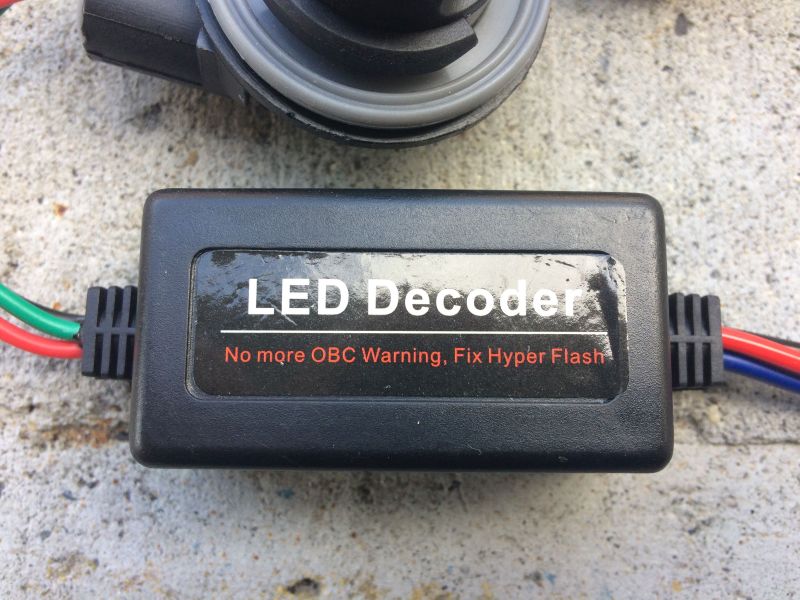 Black LED decoder box with text 'LED Decoder' and wires