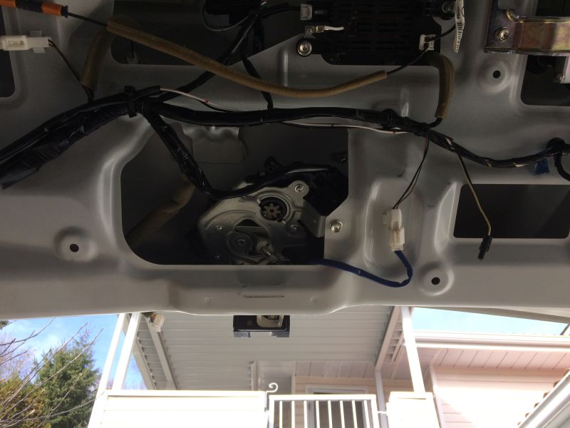 Routed the wire down the right side of the tailgate, following the main harness.