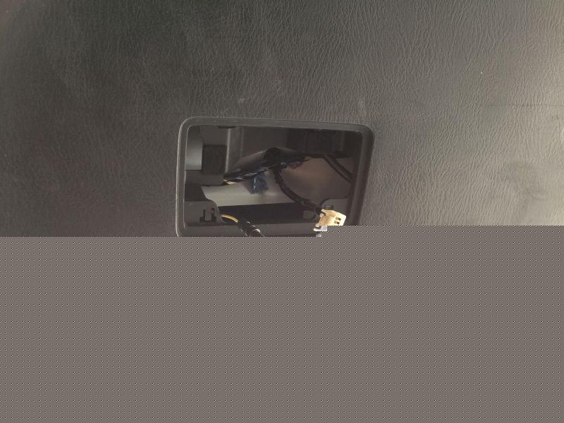 Open compartment with wiring and connector