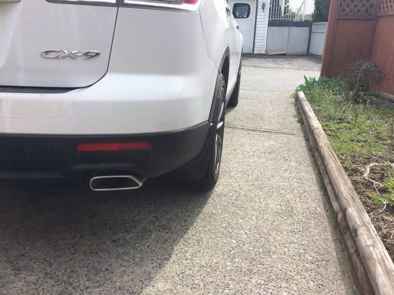 White Mazda CX-9 rear passenger side view