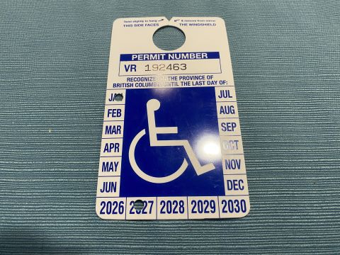 2009 Mazda CX-9 - Moved the magnets from the old placard to the new one. Surprisingly they peeled off and I was able to re-stick them, so we'll see if they s…