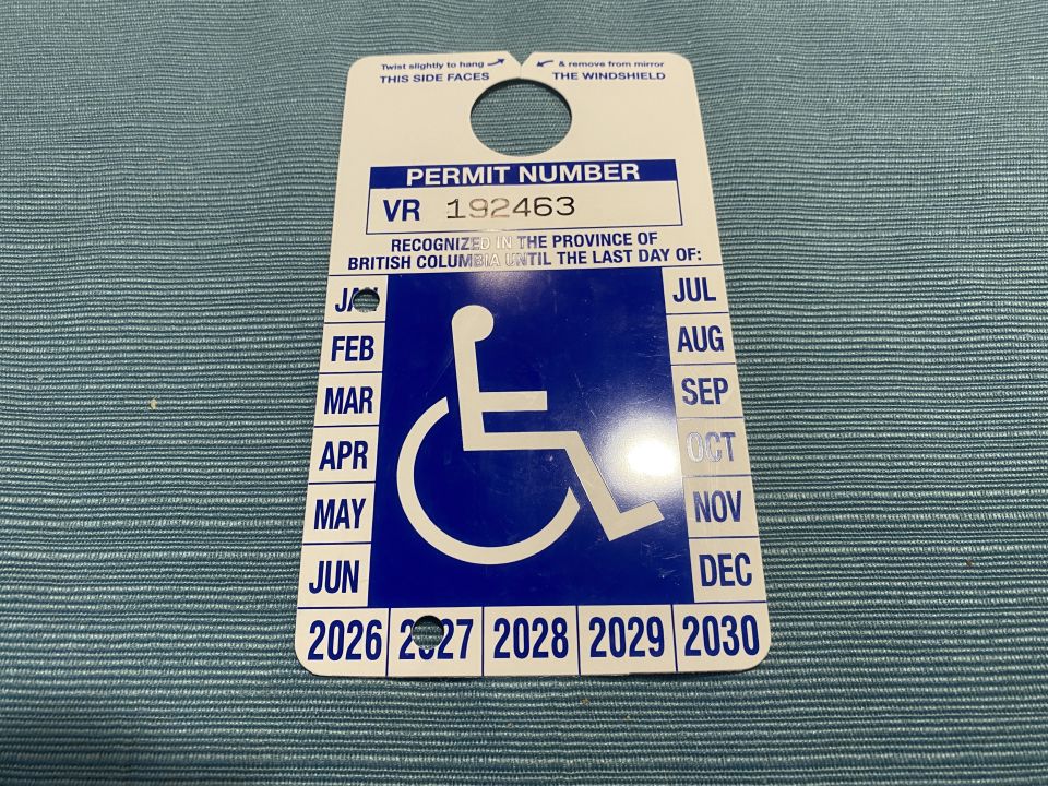 Moved the magnets from the old placard to the new one. Surprisingly they peeled off and I was able to re-stick them, so we'll see if they stay put.