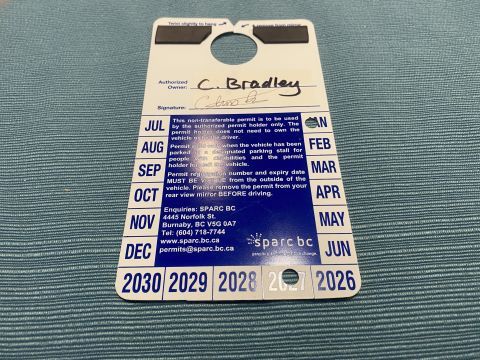 2009 Mazda CX-9 - Moved the magnets from the old placard to the new one. Surprisingly they peeled off and I was able to re-stick them, so we'll see if they s…