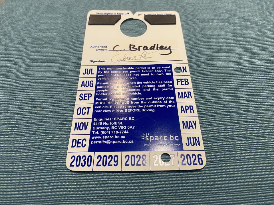 Moved the magnets from the old placard to the new one. Surprisingly they peeled off and I was able to re-stick them, so we'll see if they stay put.