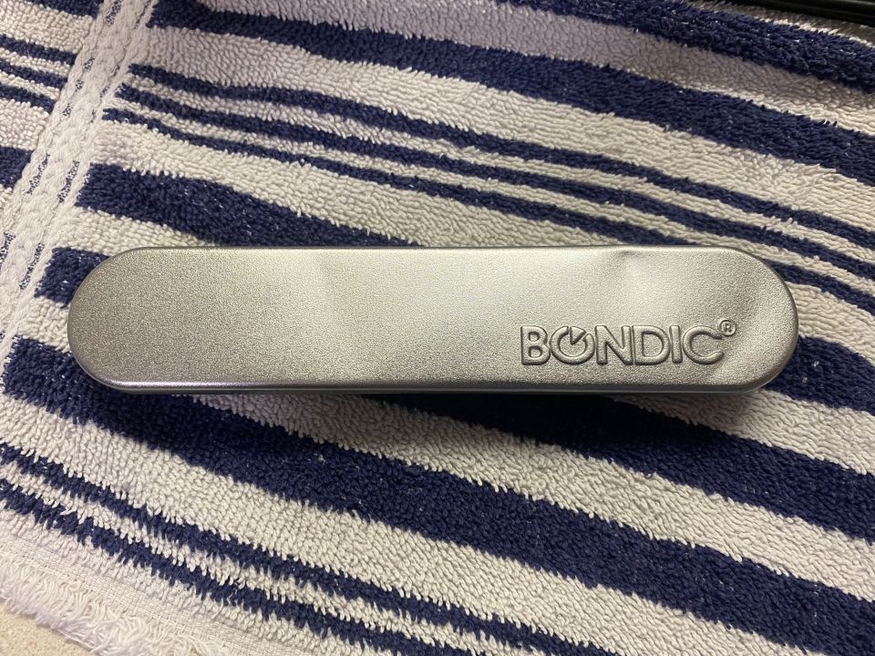 I used Bondic to hold the outlet to the enclosure.