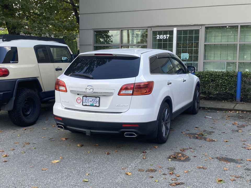 White 2009 Mazda CX-9 rear passenger side view