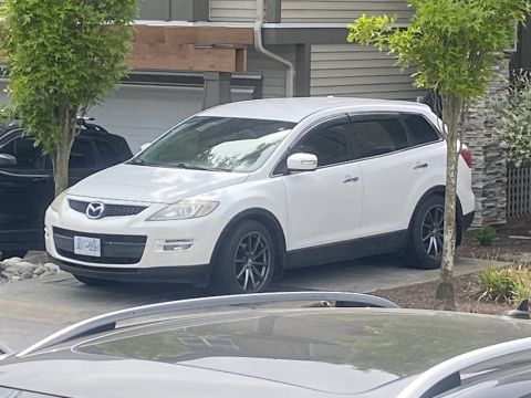 White 2009 Mazda CX-9 with tinted windows and license plate JD1-55H