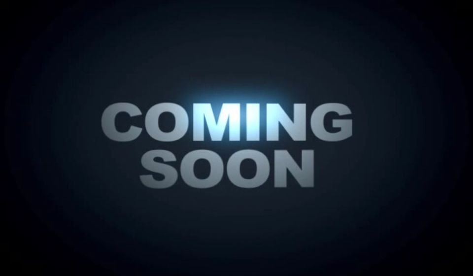 The words "COMING SOON" in large, glowing silver letters.