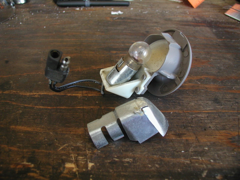 Remove the metal shield that goes around the bulb.