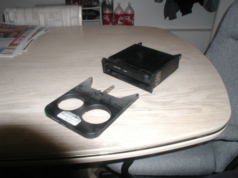 There are little tabs on top of the trays that will act as an outward stop when you pull them out. To get the trays out, just pry a little to allow the tab to slide past the point where it usually hits the outer case.