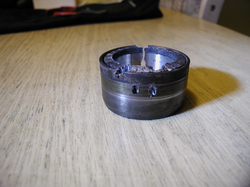 Damaged bearing on a wooden table