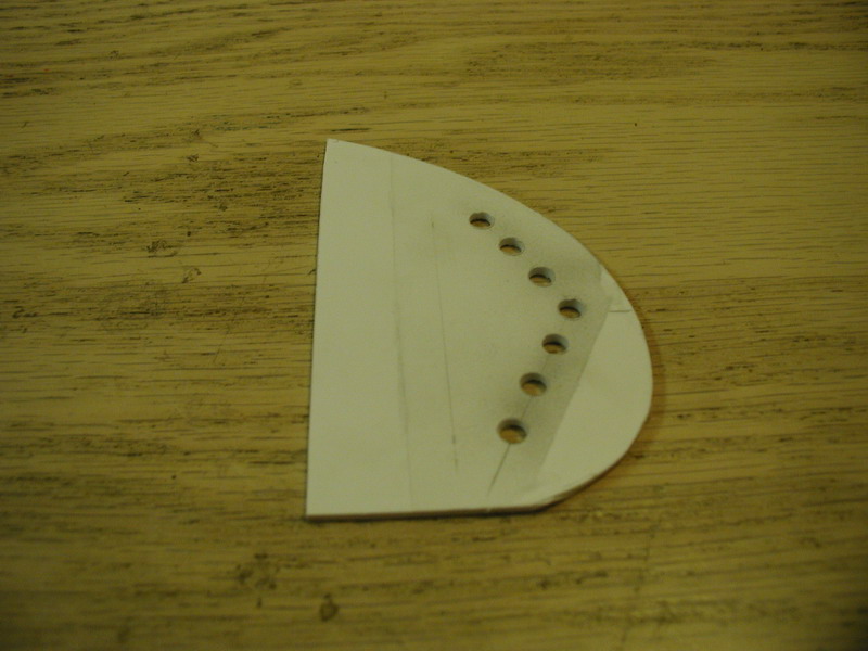 I made up a quick template of the outside end of the mirror glass.