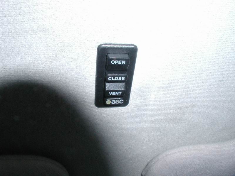 Control panel with OPEN, CLOSE, VENT, and ASC buttons.