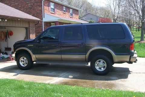 2003 Ford Excursion - This 2003 Ford Excursion is seen parked in a residential driveway.