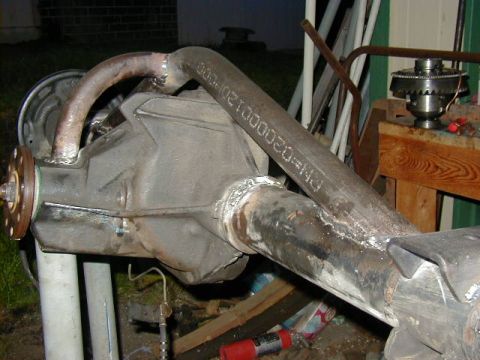1994 Ford Explorer - Custom trussing added to a rear axle, with a visible part number PN=020000.