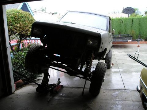 1986 Ford Bronco II - This SUV is undergoing modifications and is elevated on jack stands for work.