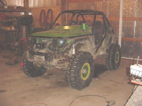 1992 Ford Bronco - This modified off-road vehicle is not a 1992 Ford Bronco.