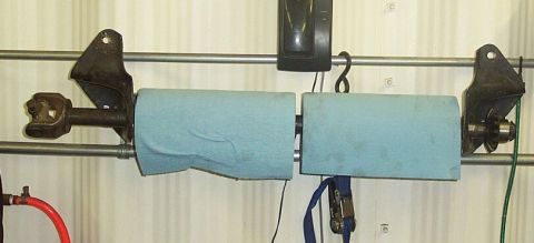 1990 Ford Bronco - Shop towel holder constructed of D44 long side shaft, TTB radius arm brackets, D44 side gear
