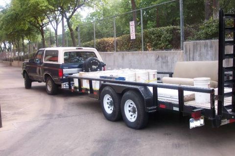 1992 Ford Bronco - On the job. Each container is roughly 50 lbs.