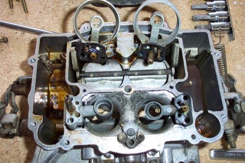1968 Ford F-100 - Venturis removed and upside down to show positions for reassembly