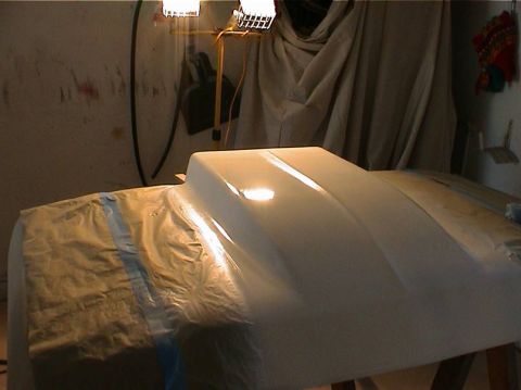 1979 Ford Bronco - Car hood covered in masking paper, ready for paint work.