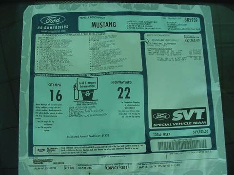 1992 Ford Mustang - Window sticker details for a Ford Mustang, including MSRP and MPG information.