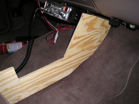 1996 Ford Bronco - A custom wooden center console is installed in the vehicle, with a CB radio mounted above it.