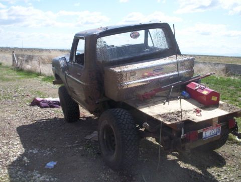 1978 Ford Bronco - This 1978 Ford Bronco has been converted into a flatbed truck, complete with a toolbox and various tools on the rear bed.
