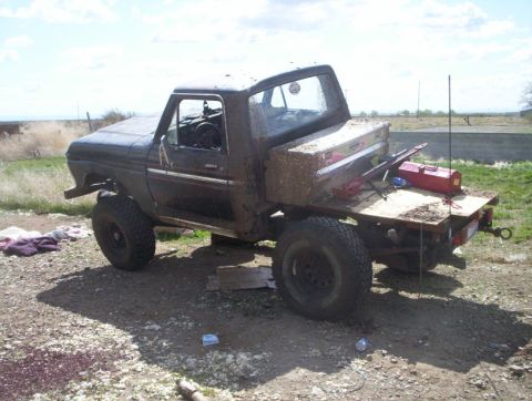 1978 Ford Bronco - This modified Ford F-Series truck features a flatbed and appears to be from the 1970s.