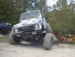 1989 Ford Bronco - This 1989 Ford Bronco is captured in a 3q-front view, appearing to be off-road.