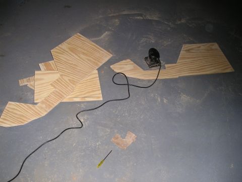 1996 Ford Bronco - Custom center console parts being cut from plywood with a sander.